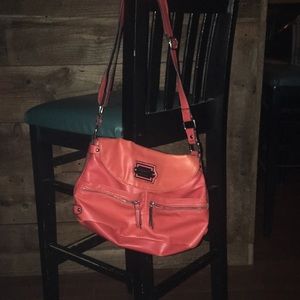 Nicole Miller bag orange 3 ext pockets 4 interior